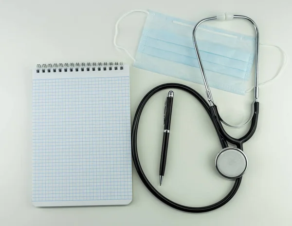 Medical Instruments Mask Notepad White Background Isolates Mock — Stock Photo, Image