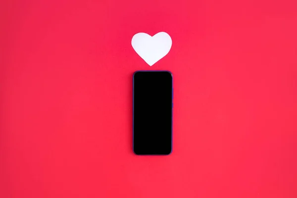 Smartfon i serce — Zdjęcie stockowe