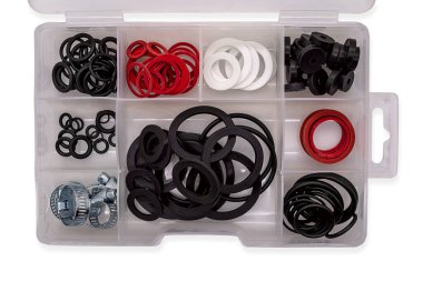 clear box with different colored sealing rings sorted by size clipart
