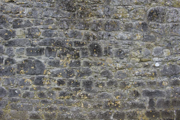 Abstrakte Textur Hintergrund Einer Alternden Mittelalterlichen Steinmauer Mit Einem Verwitterten — Stockfoto