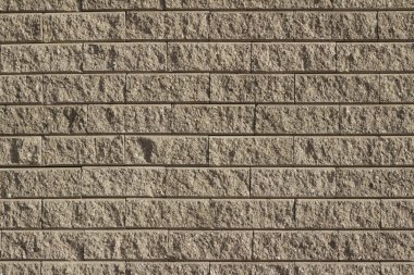 Modern bronzlaşmış dış görünüşlü taş tuğla duvar dokusu çekici kaba yüzeyli