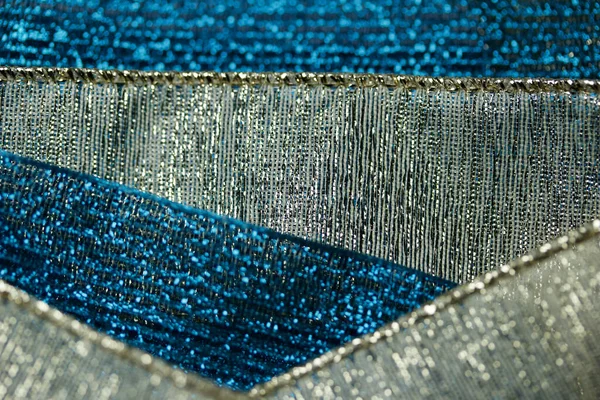 Makro Abstraktní Pozadí Třpytivé Modré Zlaté Tkaniny Stuhy Textury Bokeh — Stock fotografie