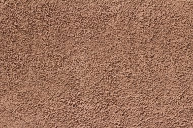 Eski bir kırmızı sıva duvar dokusunun boş arkaplanı, kopyalama alanı ile