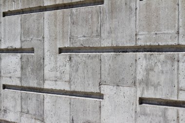Modern çizgi tasarımı ile beyaz beton duvar dokusu arkaplanının görüntüsünü kapat (açı görünümü)