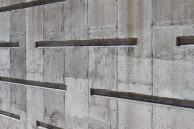 Modern çizgi tasarımı ile beyaz beton duvar dokusu arkaplanının görüntüsünü kapat (açı görünümü)