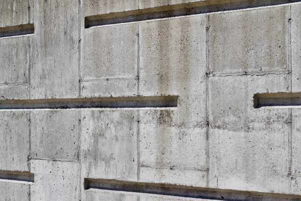 モダンなラインデザインの白いコンクリート製の石壁のテクスチャの背景のビューを閉じます 角度ビュー — ストック写真