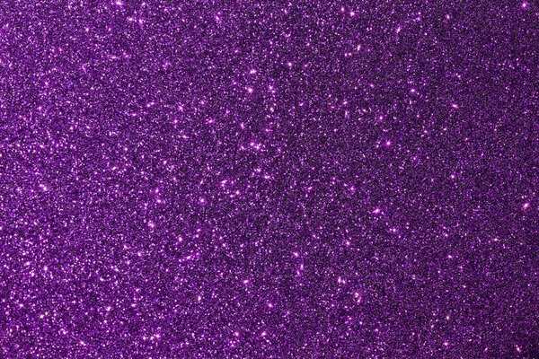 Sparkling deep purple abstract glitter texture background