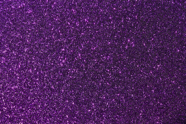 Sparkling deep purple abstract glitter texture background