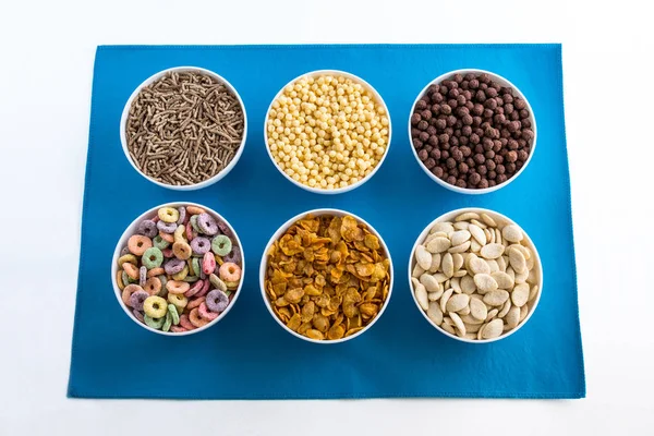 Variety of cereals separated in bowls — 스톡 사진