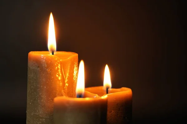 Group Three Brown Burning Candles Black Background Close Concept Comfort — Stock Photo, Image