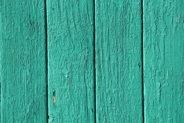 Texture of cracked green floor from wood planks. Wood floor mint color