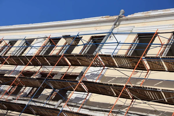 Building repair. The house is without windows. Reconstruction of the building.