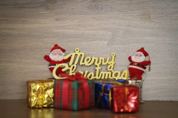 Веселого різдвяного повідомлення на дерев'яному фоні — стокове фото