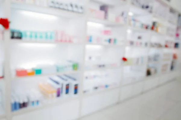 Wazig geneeskunde kabinet en winkel geneeskunde en farmacie drugstor — Stockfoto