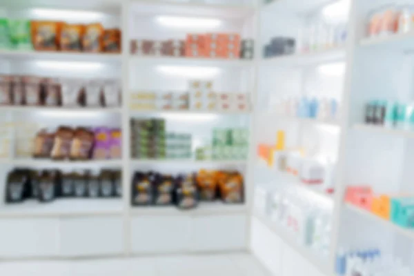 Wazig geneeskunde kabinet en winkel geneeskunde en farmacie drugstor — Stockfoto