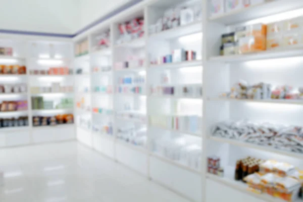 Gabinetto sfocato della medicina e farmacia del deposito e della medicina — Foto Stock