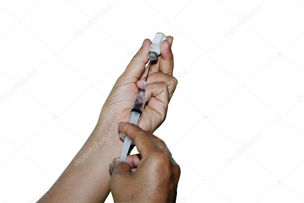 Syringe with vial on hands of a nurse,doctor administer the inje