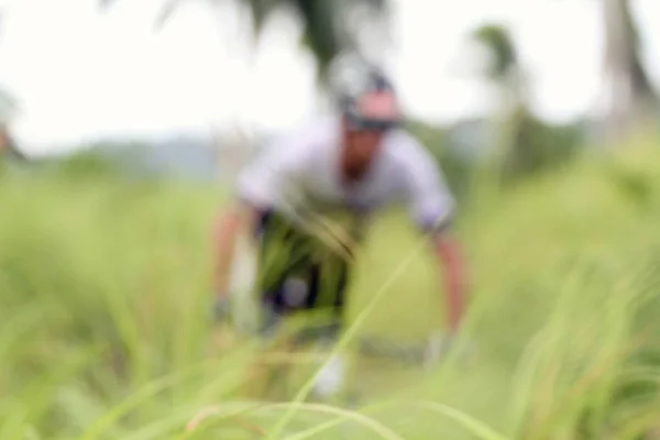 Blurry of Sport. Mountain Bike cyclist riding single track and C — Stock Photo, Image