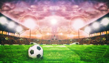 Futbol topu üzerinde yeşil alan futbol stadyumunun arka planı için 