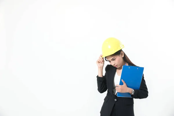 Asiatische Ingenieurinnen inspizieren und arbeiten und halten blau — Stockfoto
