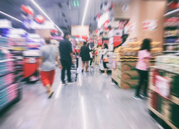 Blurry of supermarket/mall for background and shopping fashion a