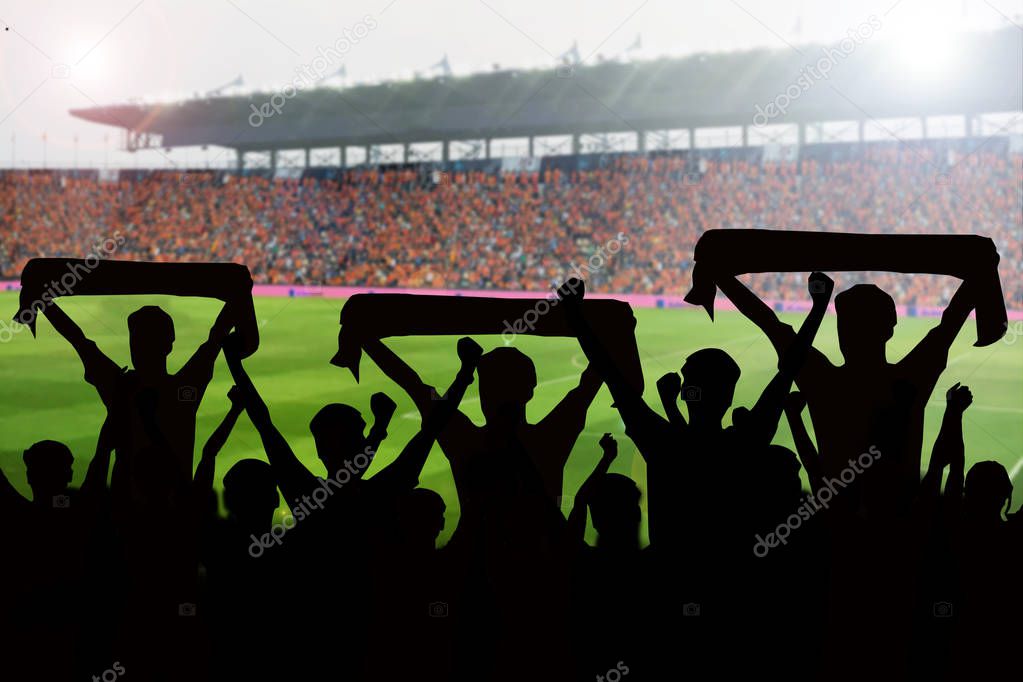 silhouettes of Soccer fans in a match and Spectators at football