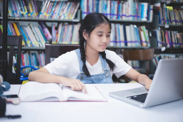 Asian Girl Students Reading Books Using Notebook Library — Stock Photo, Image