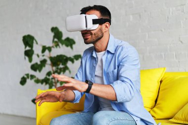 Bearded man in VR device, best virtual reality headset