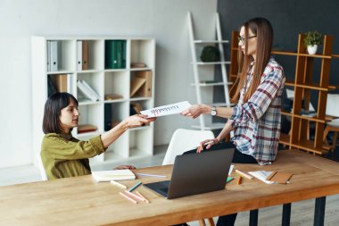 Two businesswoman have meeting, financial report presenting