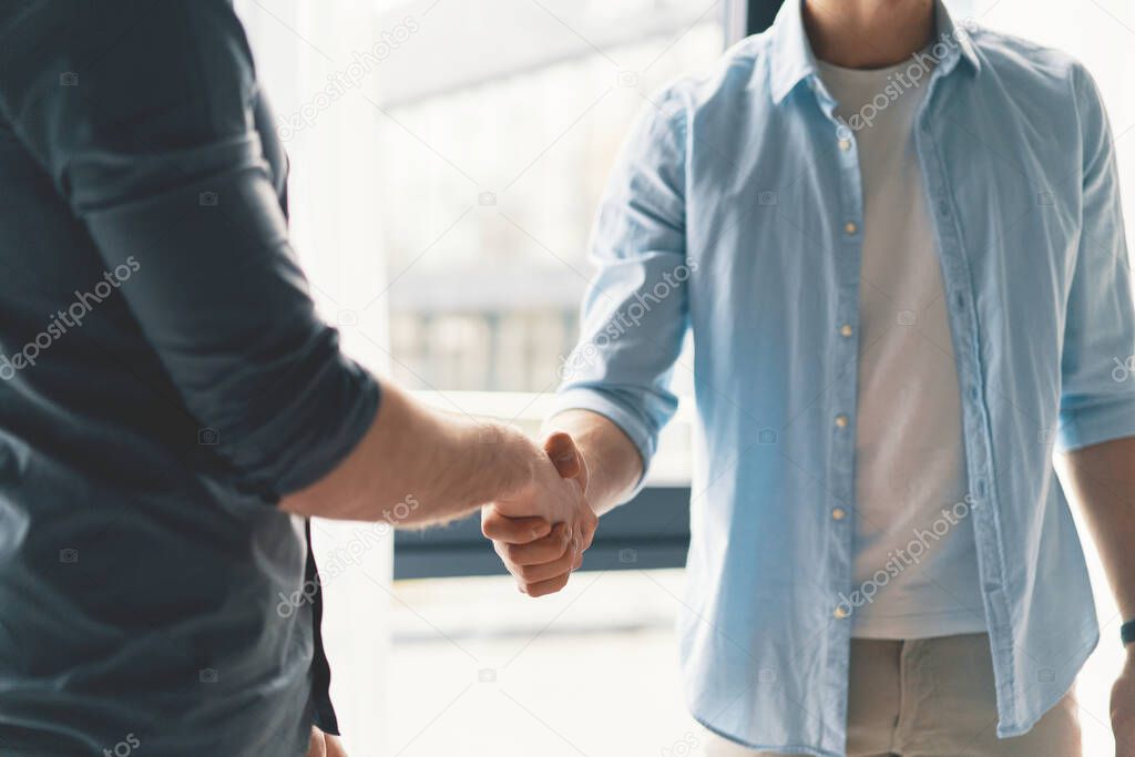 Business partnership meeting concept, businessmans handshake