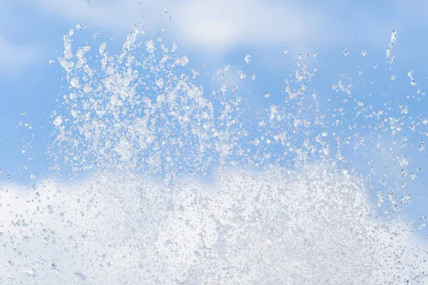 Water drops in the air on the sky. — Stock Photo, Image