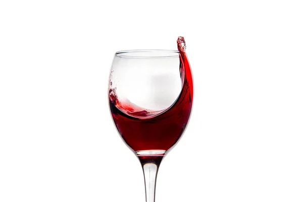 Vinho com gotas salpicantes de vinho tinto — Fotografia de Stock