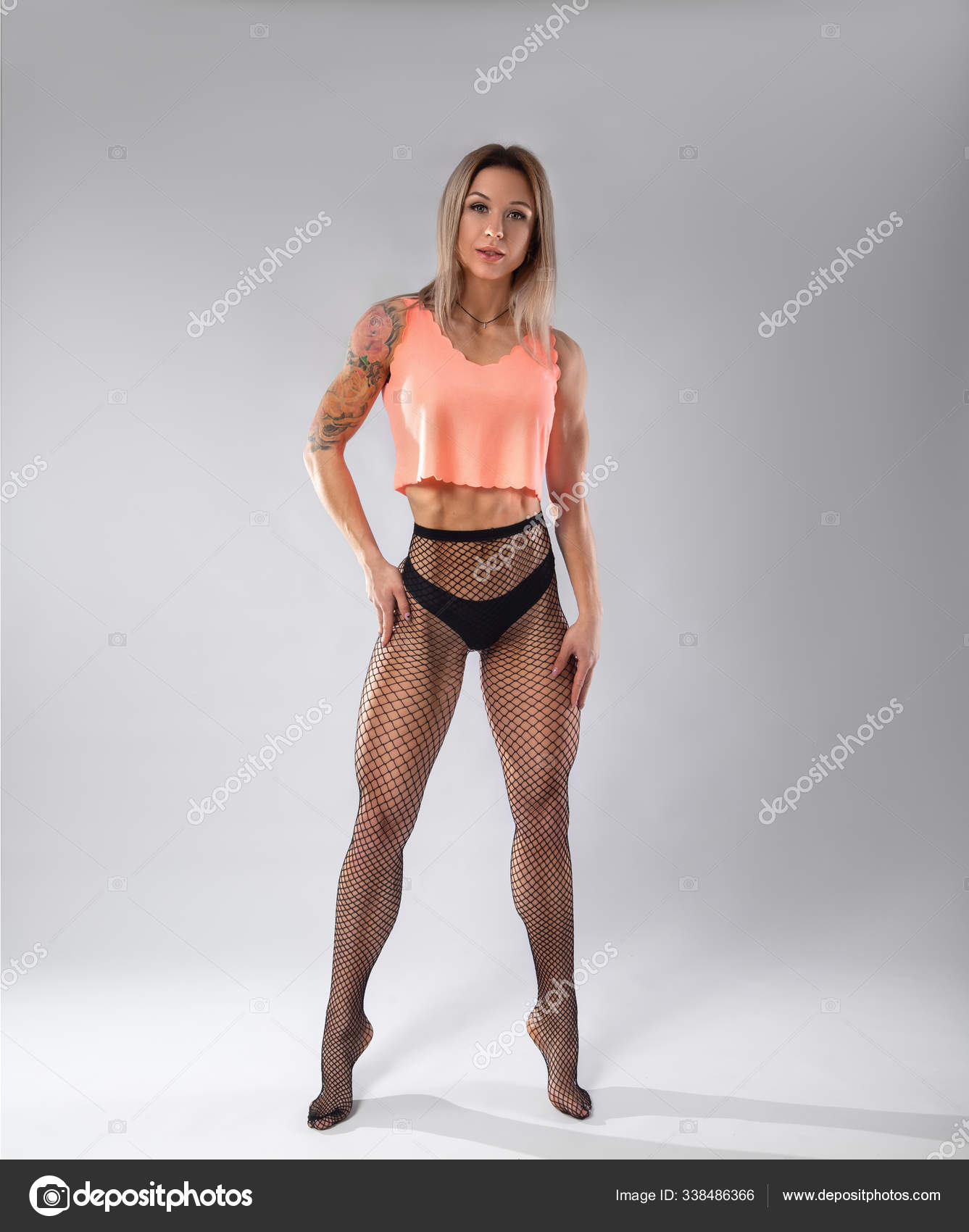 Fitness woman with perfect sport shapes posing nude in pantyhose Stock  Photo by ©Taranukhin 338486366