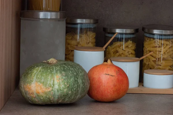 Kitchen pumpkin and pomegrane — Stock Photo, Image