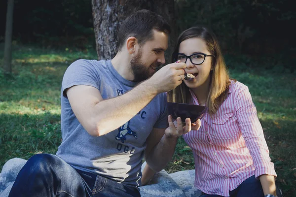 Cute happy couple on picnic — Stock Photo, Image