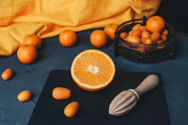 Orange tangerines and kumquat — Stock Photo, Image