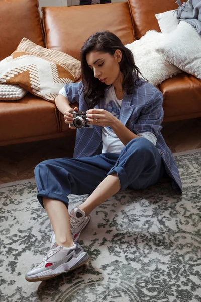 Beautiful young woman with old photo camera — Stock Photo, Image