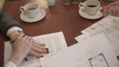 Women discuss design of childrens project 