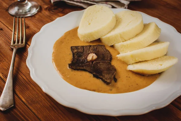 Beef tenderloin and sauce — Stock Photo, Image