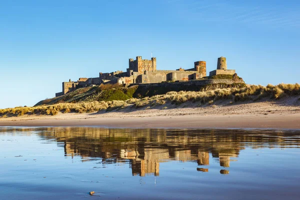 Bamburgh castle with clear blue skyline