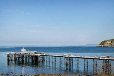 Llandudno Pier in seaside resort of Llandudno, North Wales, United Kingdom. clipart