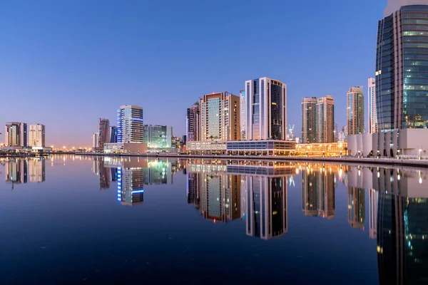 Dubai Skyline and city with Reflection in Dubai Canal.
