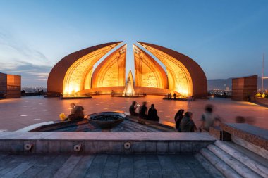 Peopel enjoying their time at Pakistan Monument located in Islamabad Pakistan clipart