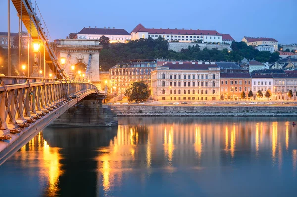 Night view of Szechenyi Bridge over River Danube in Budapest Hungary