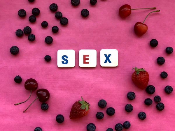 Pink Background Covered Berries Fruit Copy Sex Word Spelled Letter — Stock Photo, Image