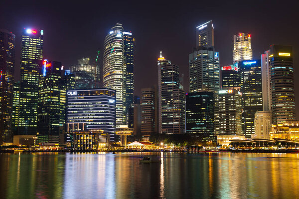 SINGAPORE-SEP 04: The downtown or city of Singapore in night time on September 04, 2014. The area around the Marina bay.