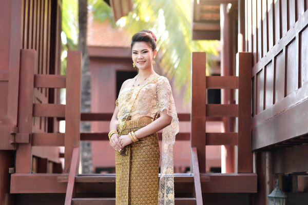 Beautiful Thai girl in Thai traditional costume