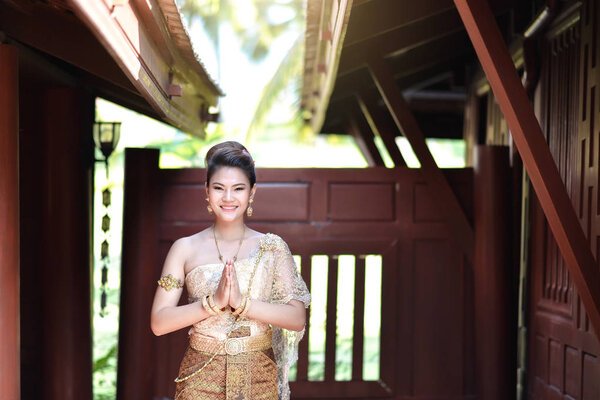 Beautiful Thai girl in Thai traditional costume