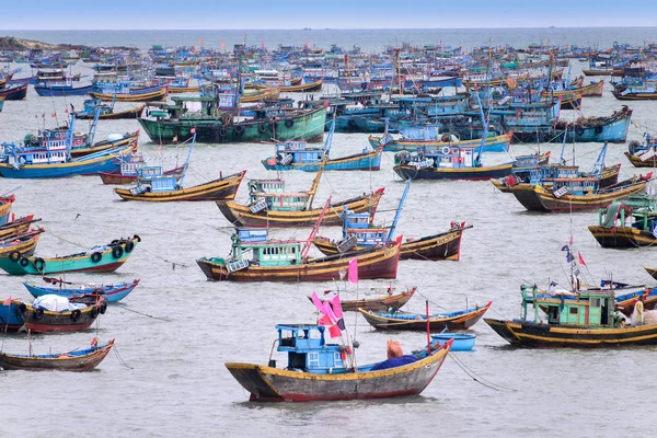 Vietnamese fishing village, Mui Ne, Vietnam, Southeast Asia. Landscape with sea and traditional colorful fishing boats at Muine. Popular landmark and tourist destination of Vietnam.