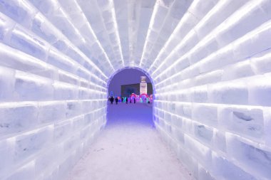 HARBIN, CHINA - JAN 21, 2017: Harbin International Ice and Snow Sculpture Festival is an annual winter festival that takes place in Harbin. It is the world largest ice and snow festival. clipart